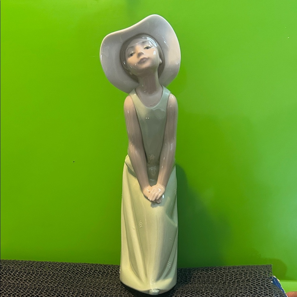 Elegant Cream and Tan Figurine with Hat
